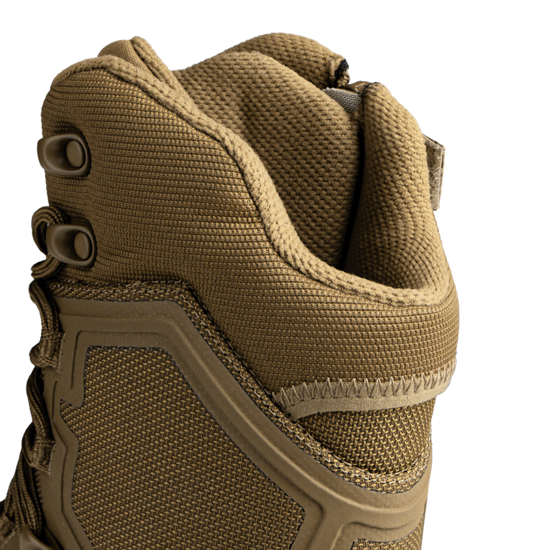 Close-up of the upper part of the Condor Brigade 8-inch Tactical Boots - Zip (Coyote Brown), highlighting textured fabric, lacing eyelets, and reinforced stitching.