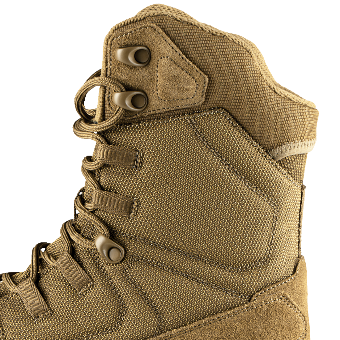 Close-up of the Condor Brigade 8-inch Tactical Boots - AR670 shows tan color, metal eyelets, durable fabric, and reinforced stitching on the side and ankle.