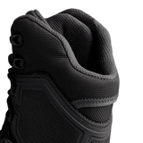 Close-up view of the upper portion of Condor Brigade 8-inch Tactical Boots in black, highlighting the textured fabric, stitching, and lace eyelets against a plain background.