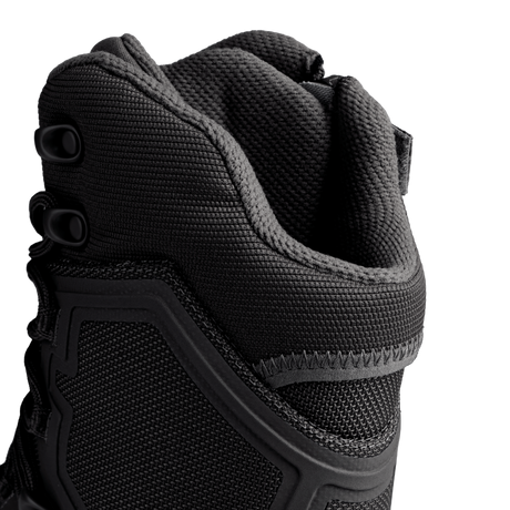 Close-up of the upper section of the Condor Brigade 8-inch Tactical Boots - Zip (Black), highlighting textured fabric, stitching, and lace eyelets against a white background.