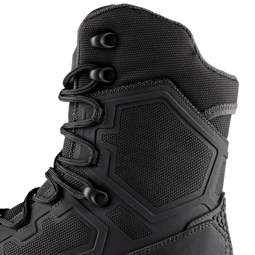 Close-up of the Condor Brigade 8-inch Tactical Boots - Zip (Black), featuring textured fabric, geometric rubber paneling, and metal lace eyelets.