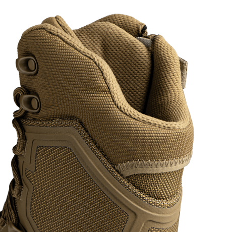 Close-up of the upper part of the Condor Brigade 8-inch Tactical Boots - Zip (Coyote Brown), highlighting textured fabric, lacing eyelets, and reinforced stitching.