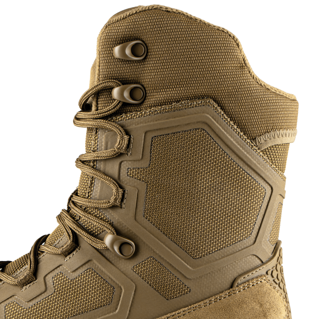 Close-up of Condor Brigade 8-inch Tactical Boots - Zip (Coyote Brown) showing textured fabric, hexagonal side panels, and metal eyelets for laces.
