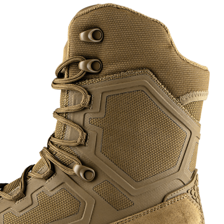 Close-up of Condor Brigade 8-inch Tactical Boots - Zip (Coyote Brown) showing textured fabric, hexagonal side panels, and metal eyelets for laces.