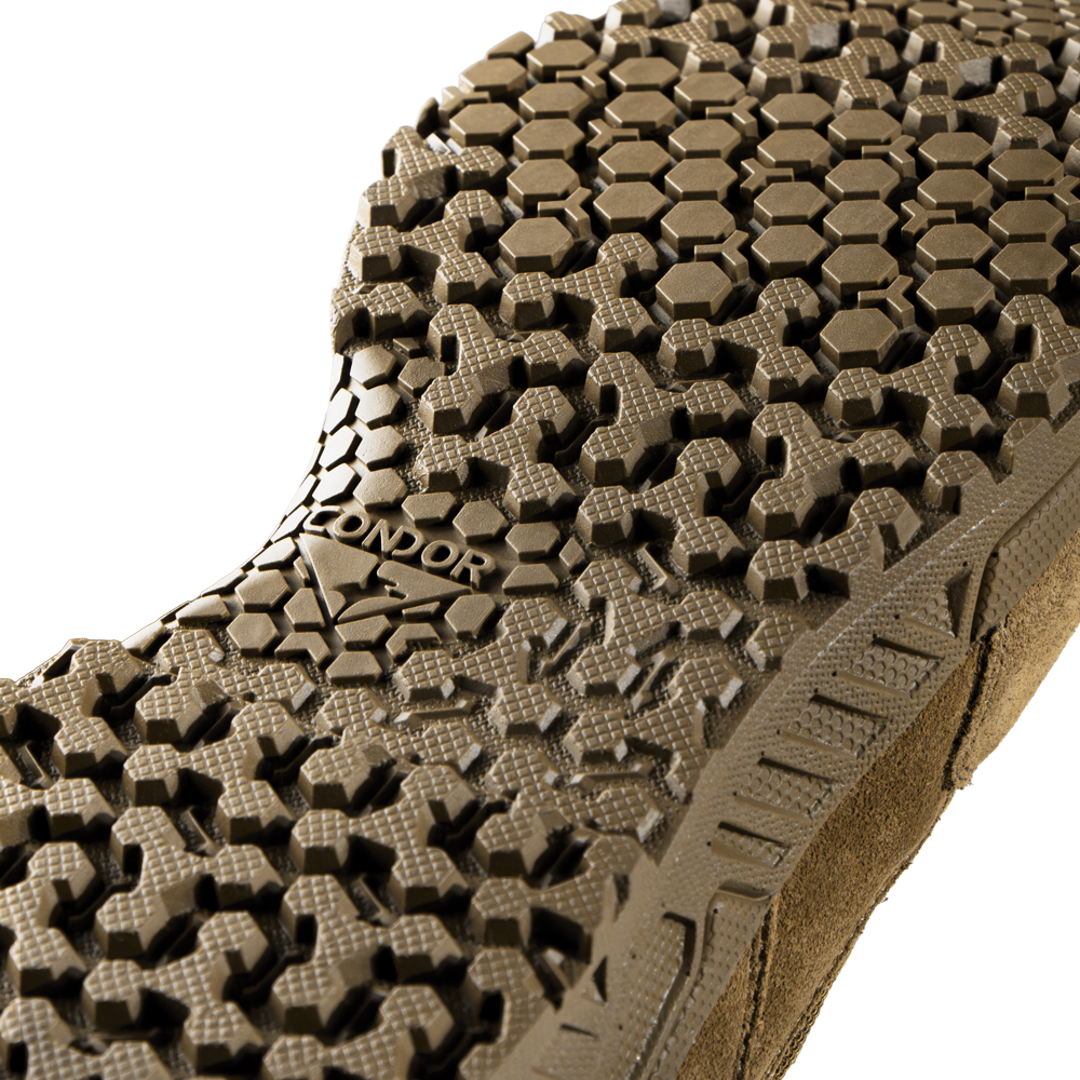 Close-up of the Brigade 8-inch Tactical Boots - Zip (Coyote Brown) by Condor, showing a brown sole with a rugged, multi-textured tread pattern and the Condor brand name in raised letters.