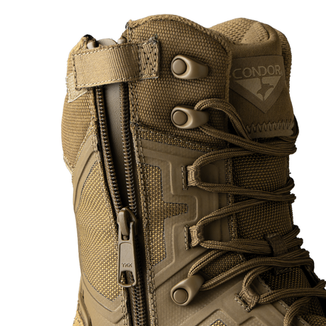 Close-up of Condor Brigade 8-inch Tactical Boots - Zip in coyote brown, featuring a side zipper, brown laces, metal eyelets, and the Condor logo on the upper part.