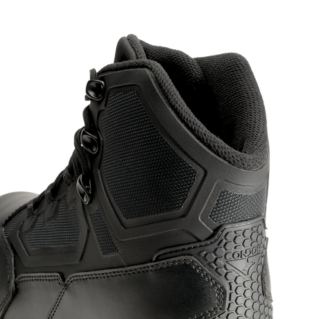 Close-up of Condor's Brigade 6-inch Tactical Boots in black, featuring mesh panels, textured accents, and metal eyelets for laces.