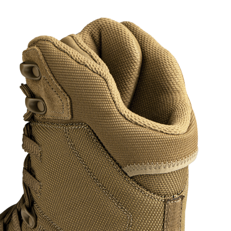 Close-up of a brown Condor tactical boot with a white background