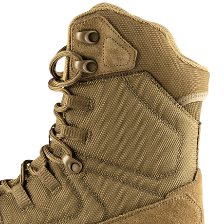 Close-up of the Condor Brigade 8-inch Tactical Boots - AR670 shows tan color, metal eyelets, durable fabric, and reinforced stitching on the side and ankle.