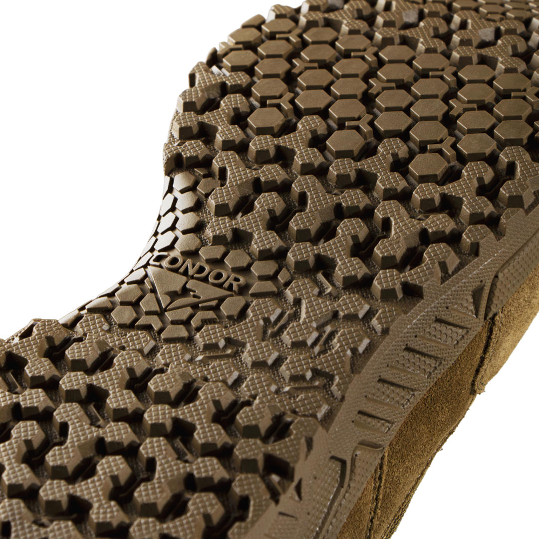 Close-up view of the Condor Brigade 8-inch Tactical Boots - AR670 outsole, featuring a brown finish and detailed hexagonal tread; "CONDOR" is visible on the sole.