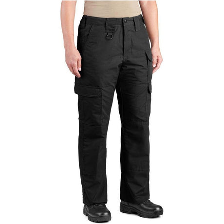 Black tactical cargo pants shown on a model from the waist down, paired with black boots and a tan top against a white background.