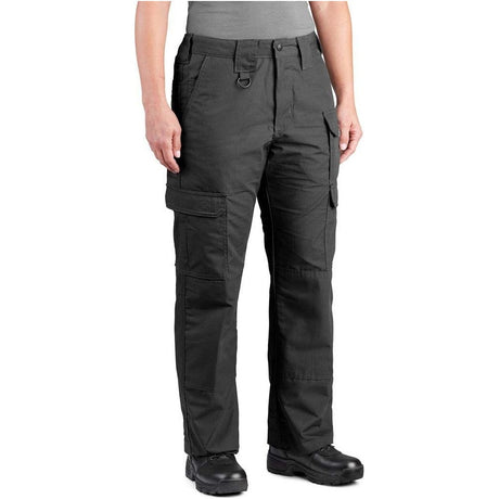 A person wearing dark charcoal cargo pants with multiple utility pockets, shown from the waist down against a plain white background.