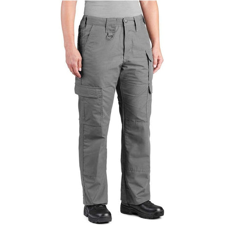 A person wearing gray cargo pants with black shoes, shown from the waist down against a plain white background.